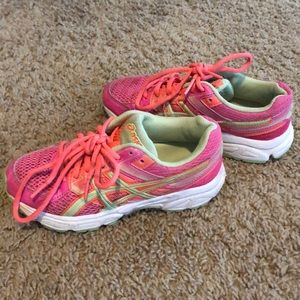 Girls ASICS tennis shoes.